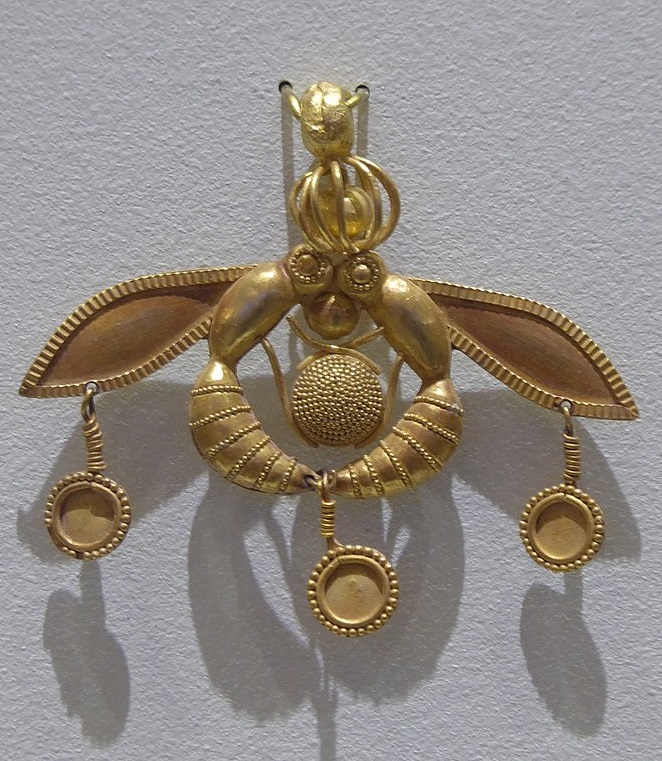 Gold bee pendant. Photo by Wikimedia Commons User Syrio