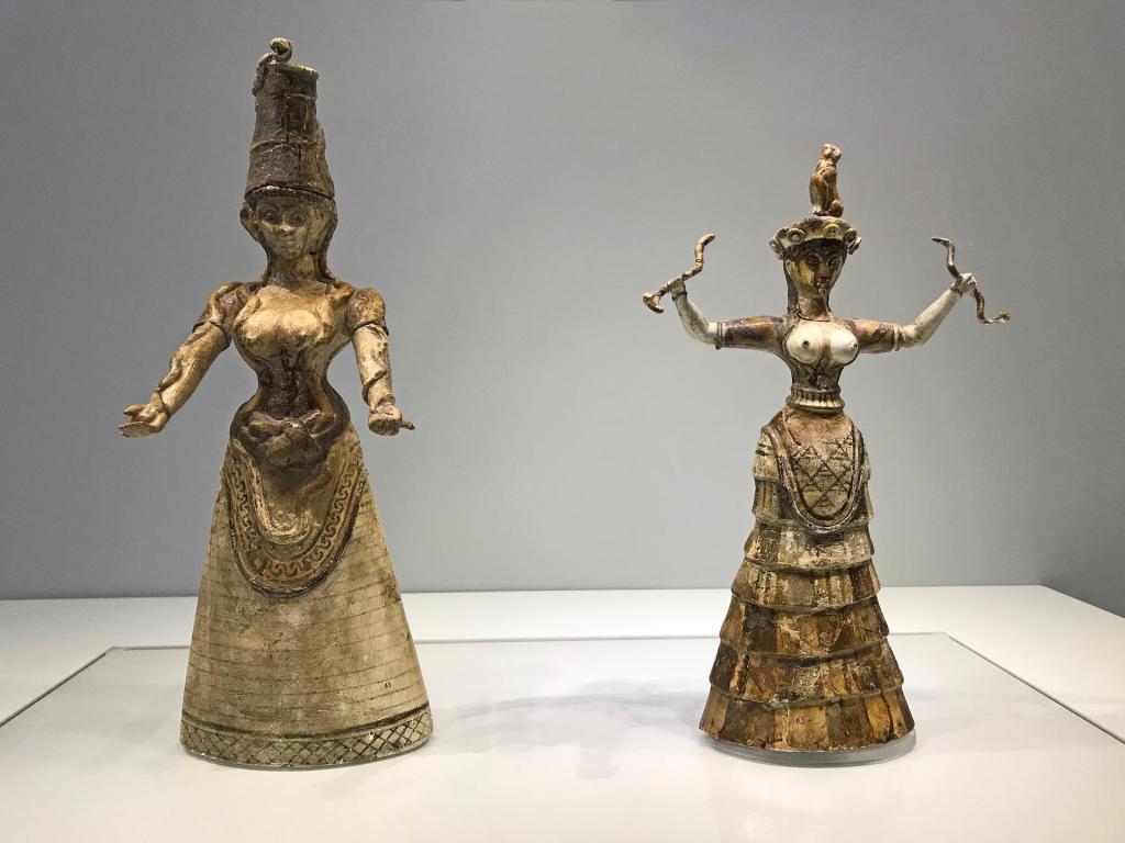 two snake goddess statues