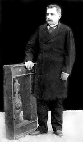 a photo of Minos next to an artifact